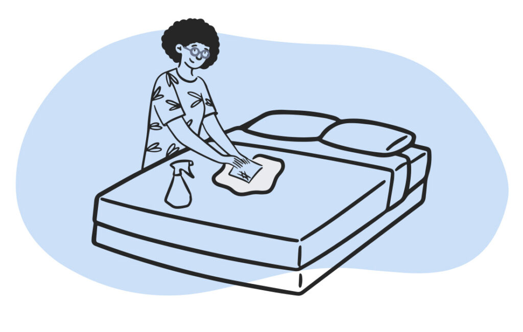Person Cleaning Mattress