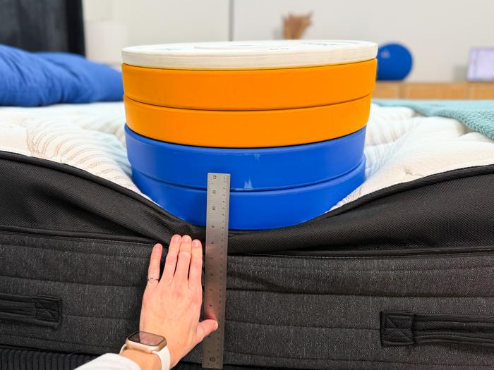 measuring the deflection of weight plates along the edge of the nolah evolution luxury firm