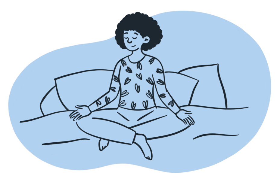 Person meditating in bed at night