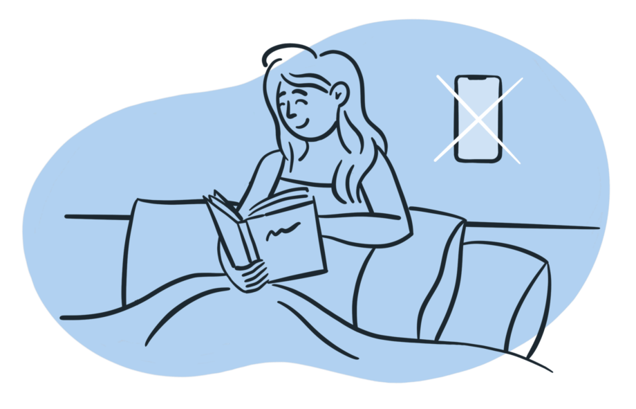 Woman sitting up in bed reading a book 